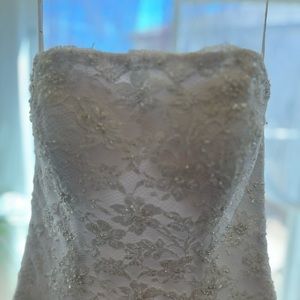 Unaltered, Never worn wedding dress from David’s Bridal